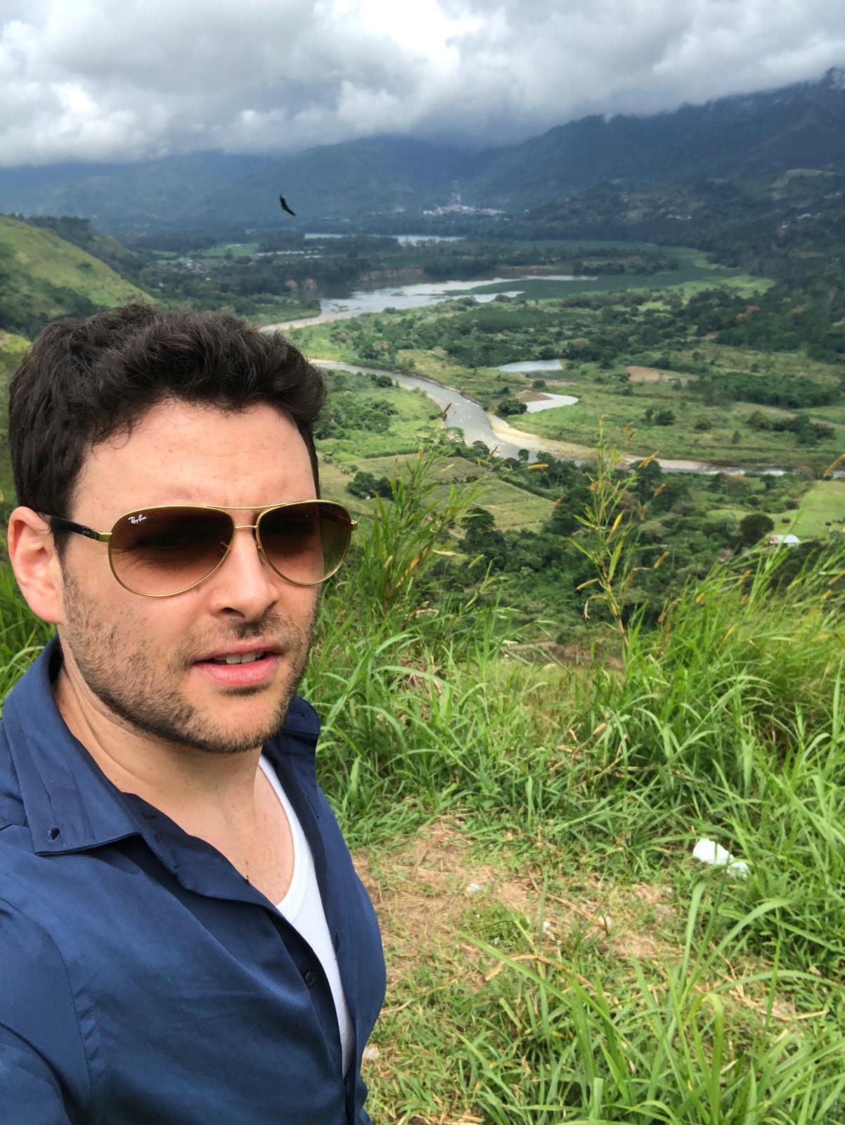 Avi Rudoi traveling across a global destination at sunset